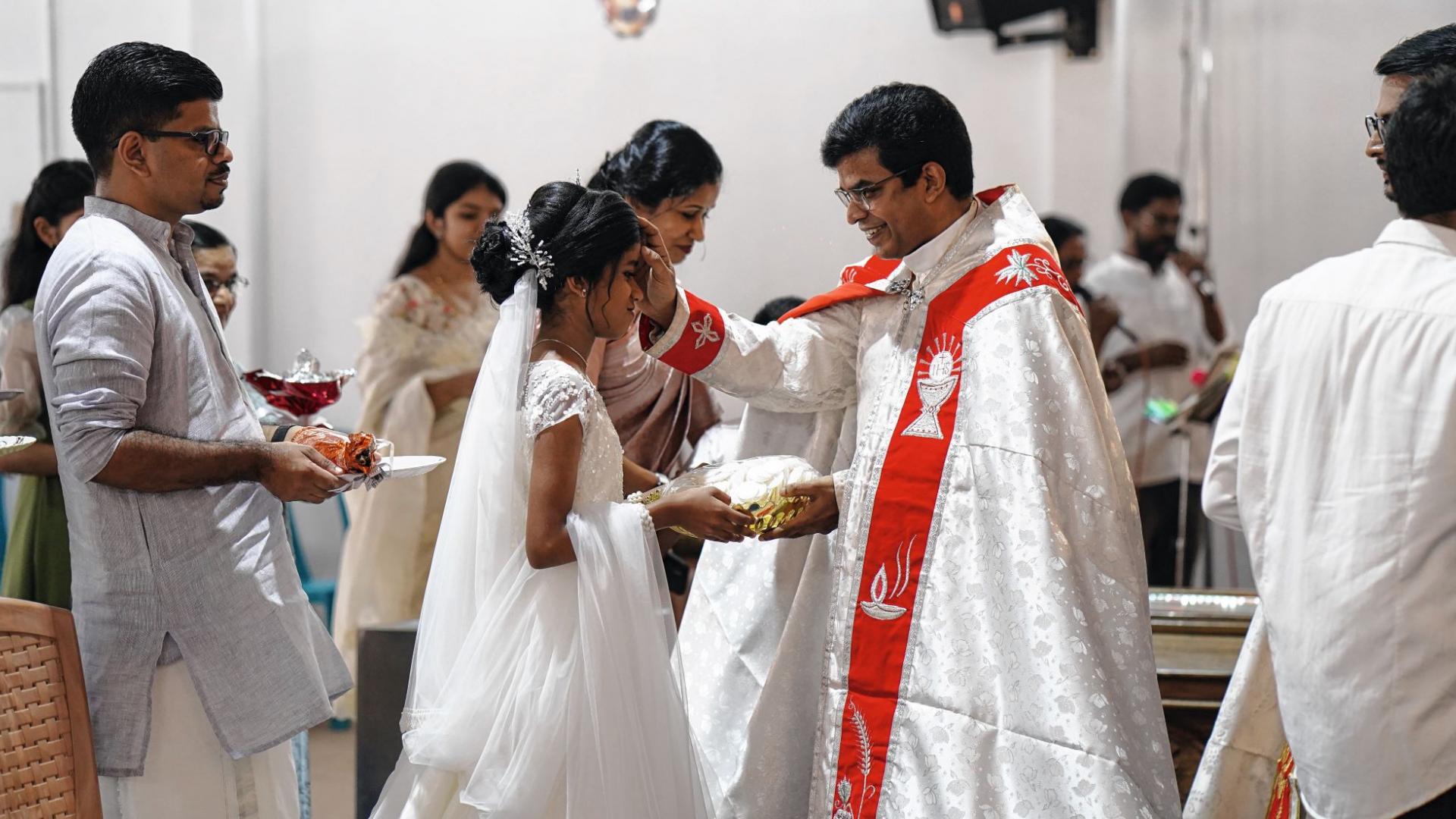Jyothish Joy bei der Erstkommunionfeier seiner Nichte